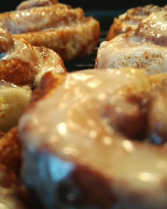 A close up photo of some newly baked cinnamon buns!