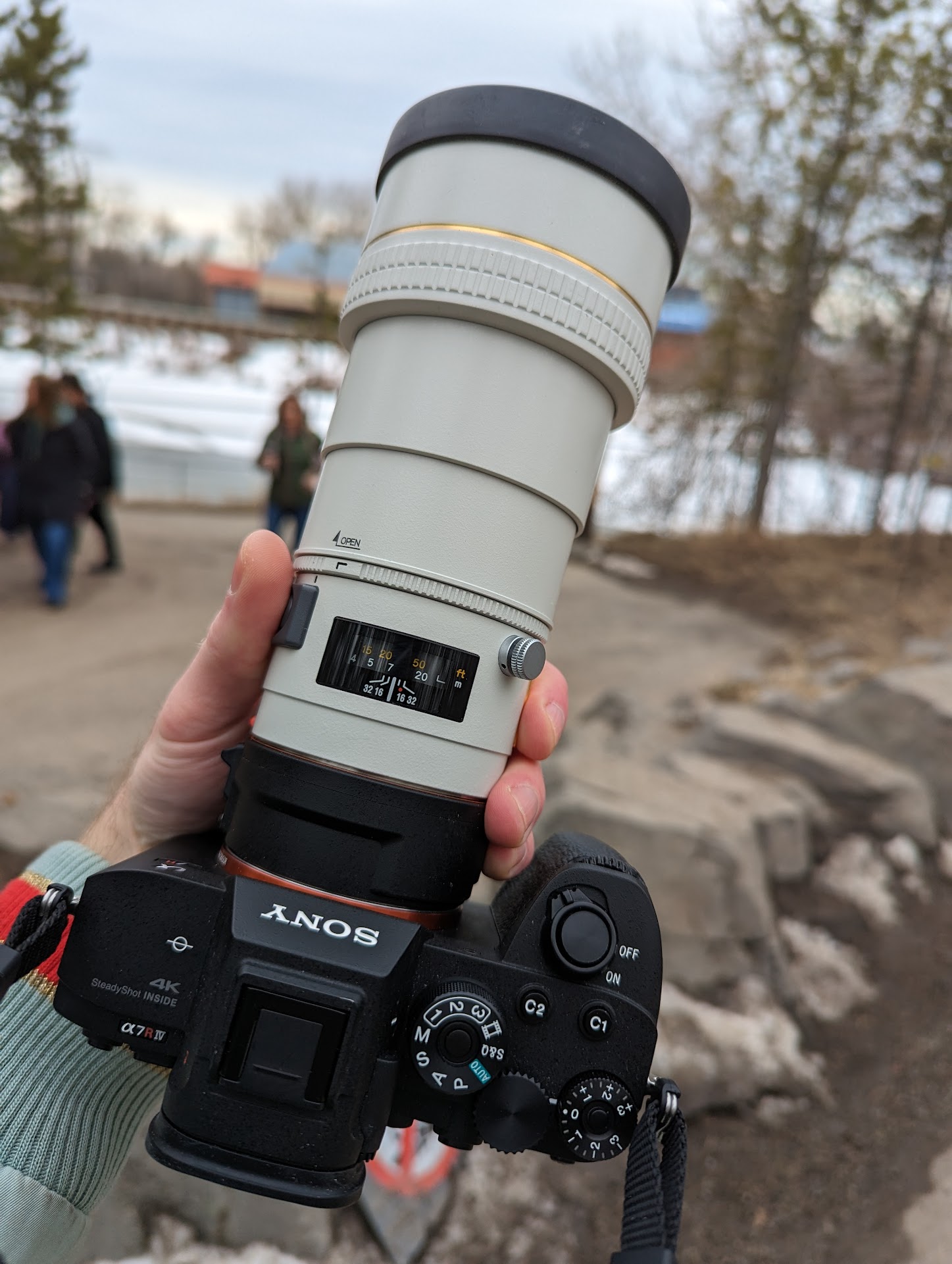 A photo of a Sony A7R4 with a Minolta 200MM lens from above, while in public!